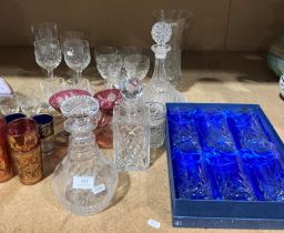 Contents to part of rack - three glass decanters,