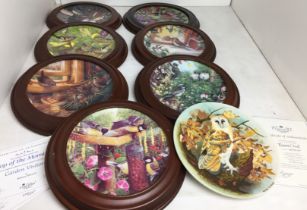 Eight Coalport bird plates (21cm diameter),