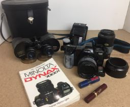 Box containing four items including Minolta Dynax 7000i camera with 35-80mm zoom lens and