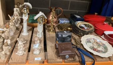 Contents to part of rack - wall plates, cameras, copper jug, pair of brass candlesticks,