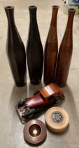Two pairs of Marks & Spencers wooden tall bottle vases,