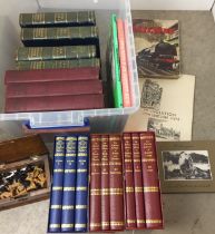 Plastic box containing wooden box containing chess and draughts pieces and twenty plus books