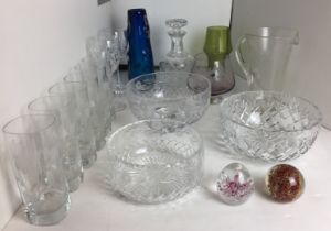 Eighteen pieces of glassware including two paperweights, decanter, set of six etched tumblers,