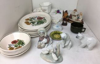 Plastic box containing twenty plus items including four Lladro figurines - two Polar bears 10cm and