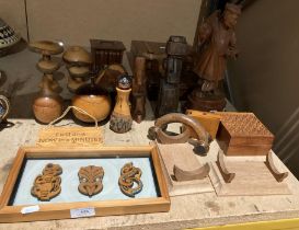 Contents to part of shelf - a collection of treen including carved oriental figure,