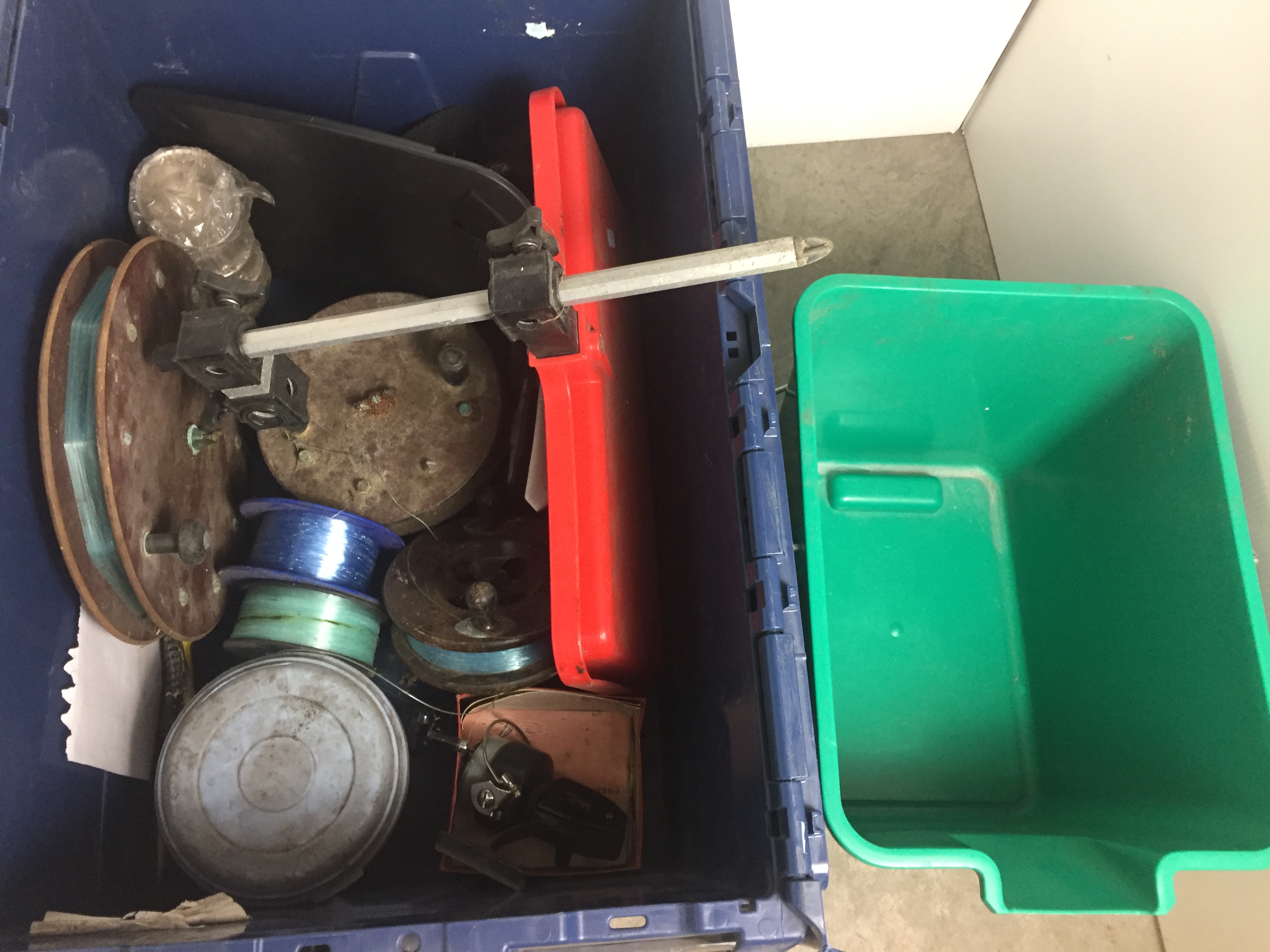 Blue plastic box containing fishing tackle including Ryobi Gilfin no.