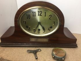 Two clocks - wooden framed mantel clock 39 x 22cm high with plaque presented to Willie France 1931