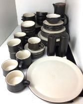 Fifty one pieces of brown and off-white Purbeck Pottery tea/dinner service including six each of