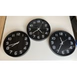 3 x Black battery operated wall clocks