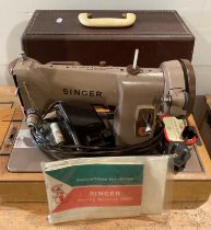 A Singer 185K electric sewing machine in carrying case (no test - damaged flex cut off) (saleroom