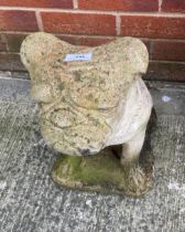 Large concrete garden ornament of a seated bulldog,