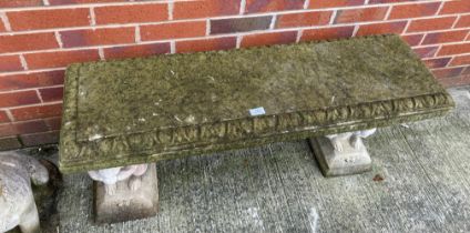Concrete garden bench with concrete hare supports,