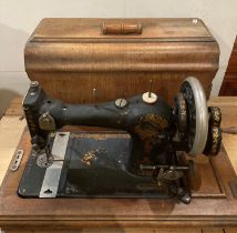 Jones manual hand-operated sewing machine in a mahogany carrying case (saleroom location: S3 ENT)