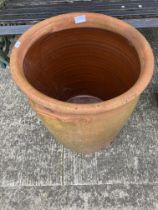 A large terracotta planter,