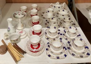 Contents to part of rack - twenty-four PCS of Wellington china tea service,