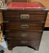 Mahogany four-drawer side unit with red tooled leather top,