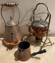 Three items - a copper kettle, a copper spirit kettle on brass stand,