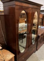 Mahogany double door wardrobe with oval mirrors to each door over long frieze drawer 132 x 202cm