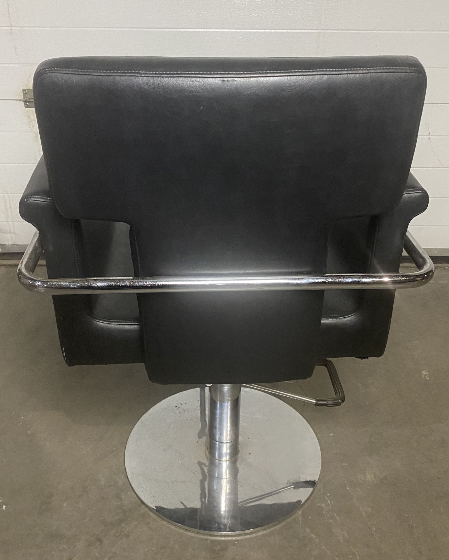 Barbers armchair in black rexine with rounded arms chrome side trail and front-operated pump action, - Image 3 of 3