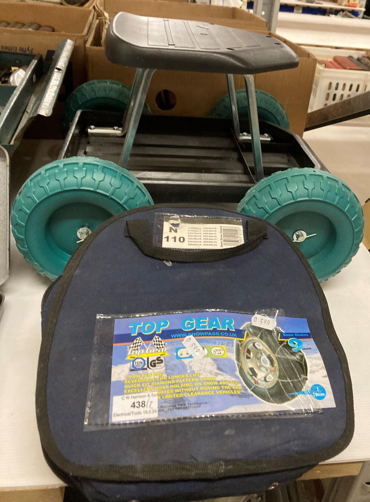 A pair of Top Gear 9mm car wheel snow chains and a wheeled weeding seat (saleroom location: R02)