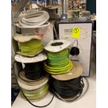 Contents to part of rack - nine part reels of assorted electrical cable (saleroom location: V06)
