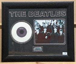 Framed limited edition white vinyl disc of Help by The Beatles, with a photo print of the group,