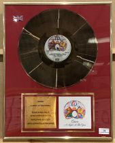 Framed limited edition Collectors Series Gold Disc of Queen's Night at the Opera album, serial no.