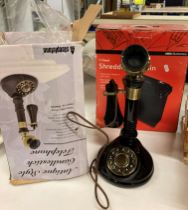 2 Items - an Asda 5 sheet paper-shredder and a candlestick telephone (U03)