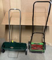 A Challenge hand-push cylinder mower and Evergreen seed spreader (K13)