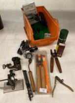 10 Items - to include bullet molds, lead ladle, barrel cleaner, head light,