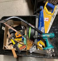 Wheelbarrow and contents - hammers, saws, tape measures, extension reel,