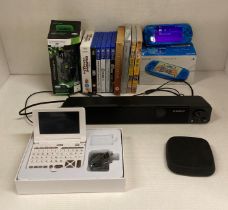 Quantity of electrical items including Sony PSP, Xbox 360 controller, Elegant sound bar,