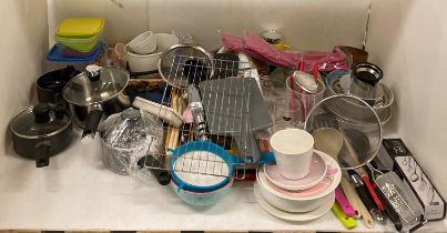 Contents to half of shelf - kitchen items to include stainless steel sieves, cooking pans,