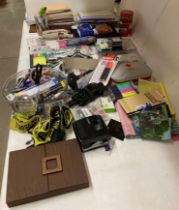 Contents to shelf area - large quantity of office supplies - staples, hole punch, note pads,