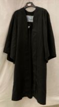 A black graduation robe by Gray & Son Ltd (size 48") (saleroom location: H05 RAIL)