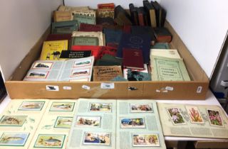 Contents to tray - four cigarette card albums, books relating to Holme Valley and West Yorkshire,