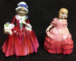 Plastic box containing two Royal Doulton figurines Lavinia 13cm high and Rose 12cm high (saleroom