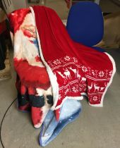 Four items including two Christmas throws and two blue fabric office swivel chairs (saleroom