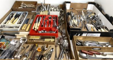 Plastic box containing large quantity of mainly stainless cutlery, nut crackers, corkscrews,