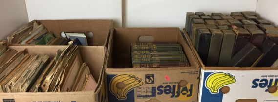 Contents to four boxes including thirty-three pianola rolls and two boxes of musical scores,