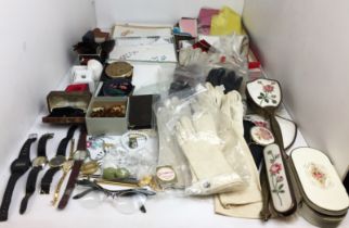 Two boxes containing nine pairs of ladies gloves, five watches, ladies handkerchiefs and scarves,