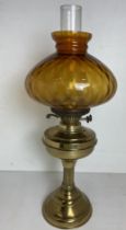 Brass oil lamp with glass chimney and brown glass shade 55cm high (small chip to top of shade)