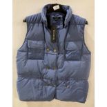 8 x Rising blue buttoned body warmers,