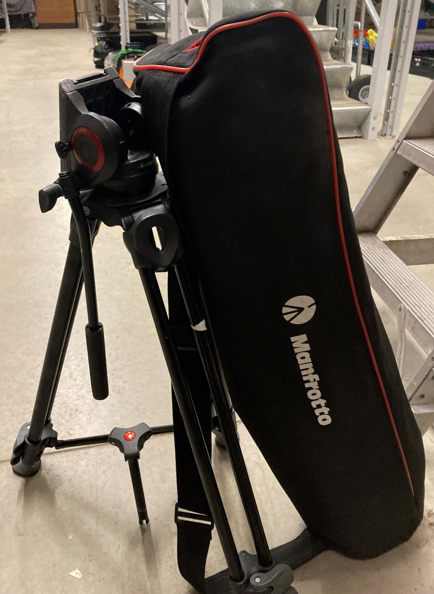 Manfrotto camera tripods and carry bag (saleroom location: D08)