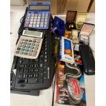 4 x Assorted keyboards, 2 x calculators, 1 x hole punch, cuff links, 1 x flexible torch, tie pins,