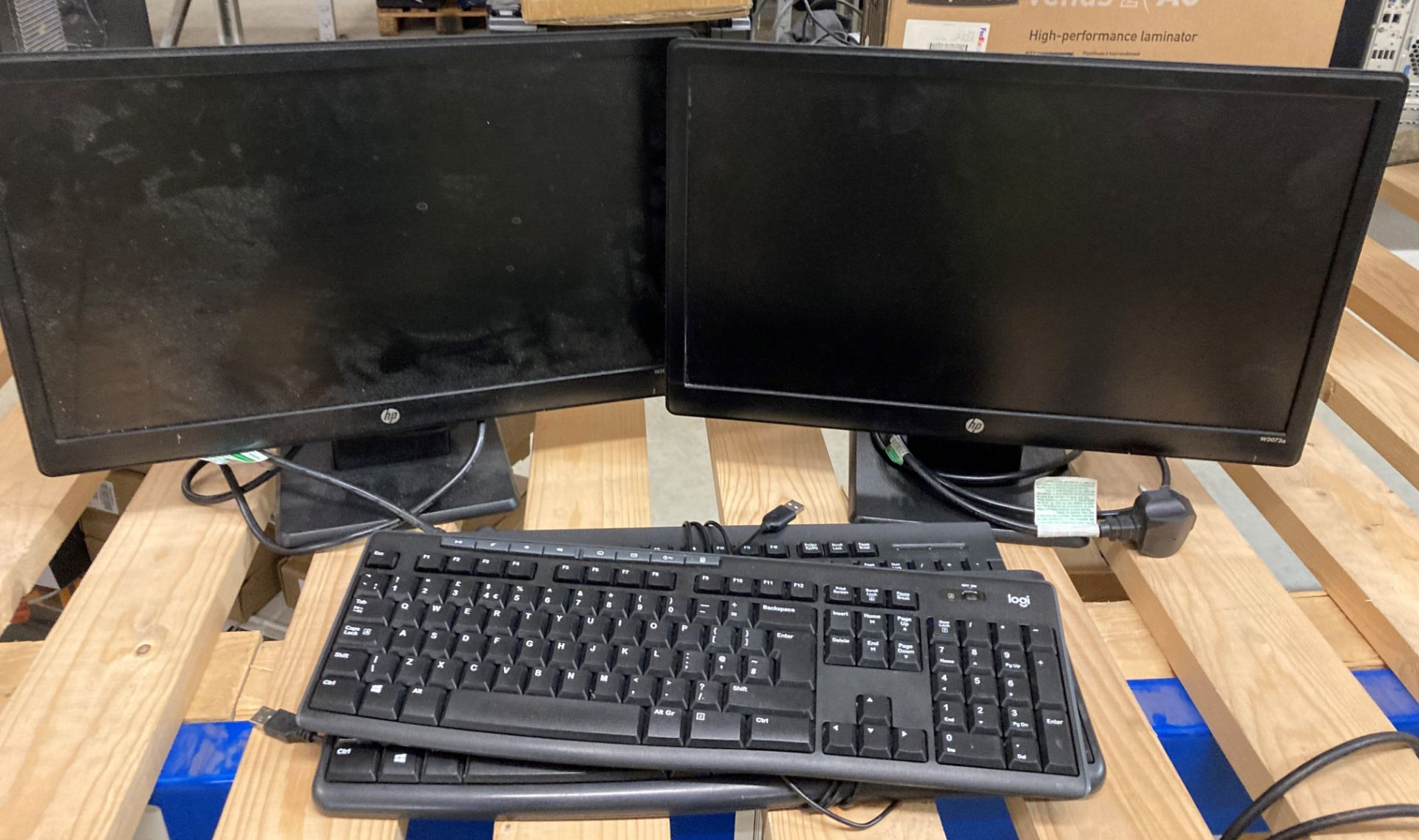 2 x HP W2072A computer monitors complete with 3 x assorted keyboards and power leads (M10)