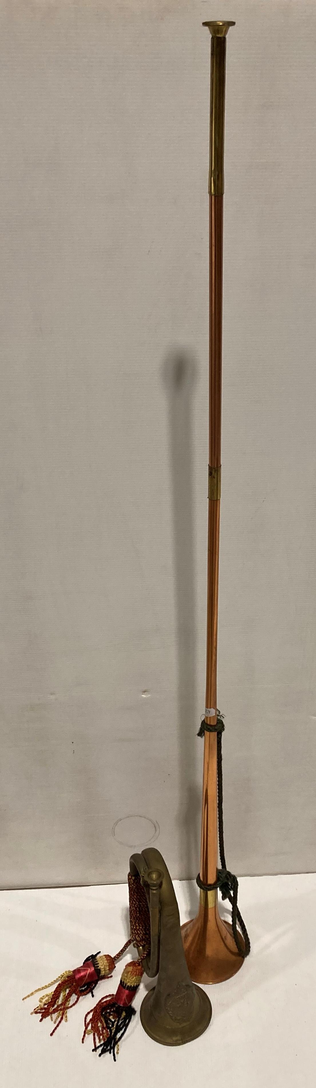 Copper hunting horn and an Argyll and Sutherland bugle (Saleroom location: S2 QB07)