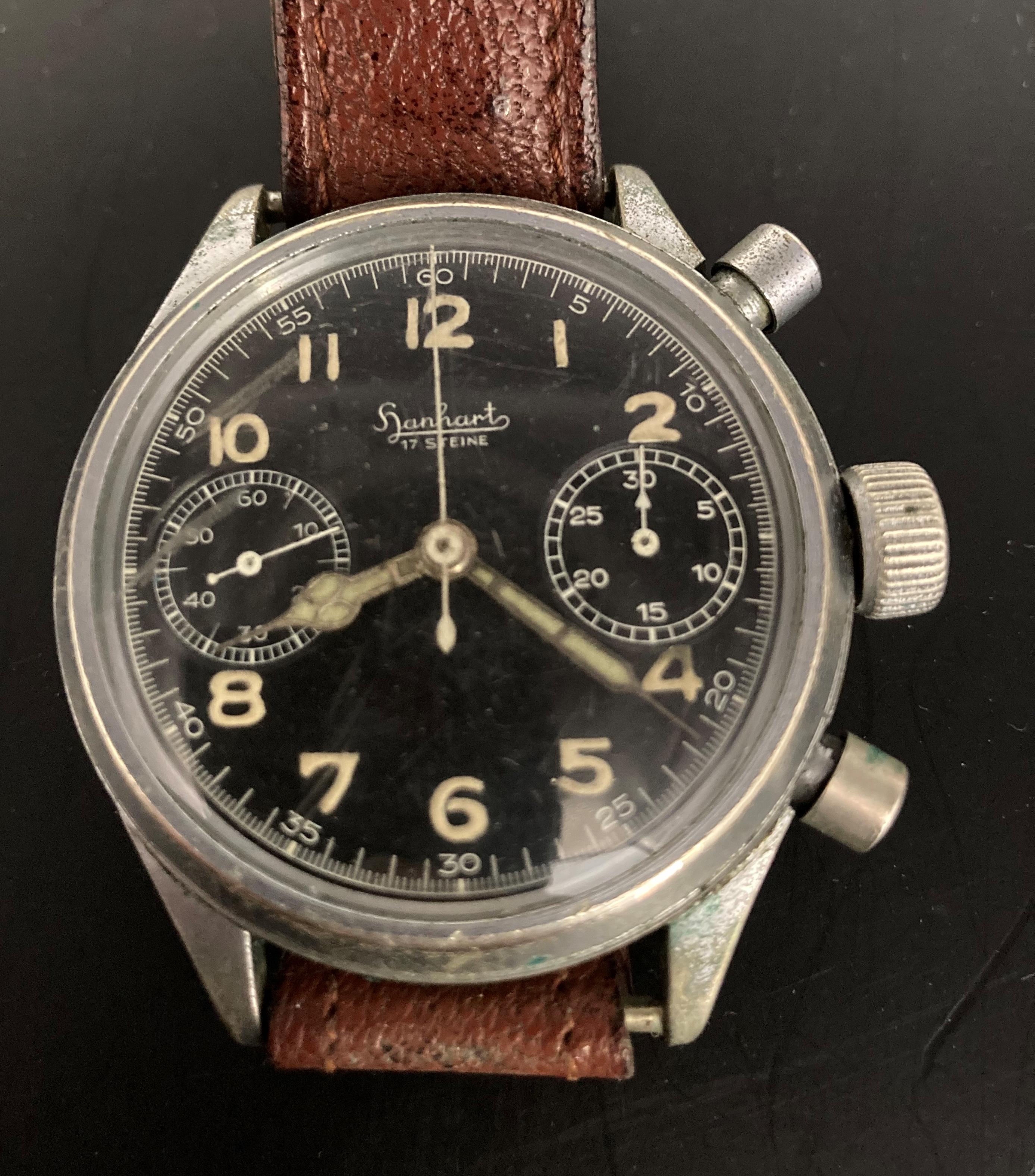 A Hanharts World War II Luftwaffe pilots chronograph with black face and brown leather strap