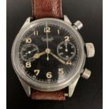 A Hanharts World War II Luftwaffe pilots chronograph with black face and brown leather strap