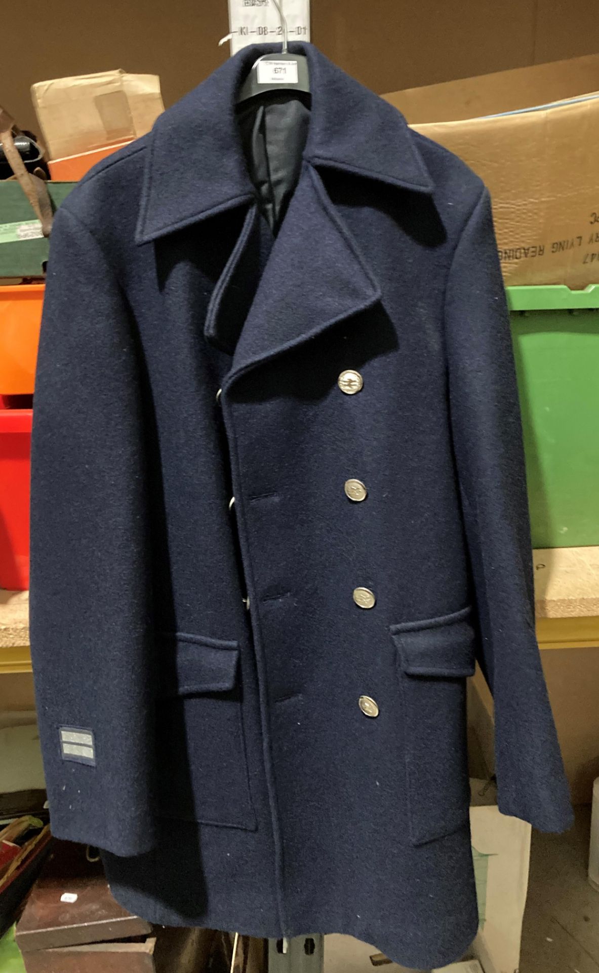 A British Rail overcoat in blue by Del Guerra Ltd, S.